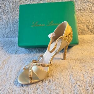Lauren Lorraine Gold Heels